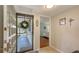 Welcoming entrance with a view into the home and a peek at the bedroom at 564 Lakeside Dr # 564, Bradenton, FL 34210