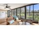 Comfortable Florida room with views of the backyard and pond at 564 Lakeside Dr # 564, Bradenton, FL 34210