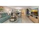 Bright and open living room seamlessly connects to the dining area and kitchen at 564 Lakeside Dr # 564, Bradenton, FL 34210