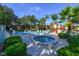 Enjoy the luxurious hot tub and community pool surrounded by beautiful greenery in this inviting outdoor space at 564 Lakeside Dr # 564, Bradenton, FL 34210