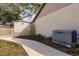 Backyard area with a storage shed, privacy fence and generator at 5902 22Nd Avenue E Dr, Palmetto, FL 34221