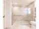Tile walk-in shower with glass doors and grab bar at 5902 22Nd Avenue E Dr, Palmetto, FL 34221