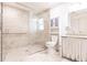 Walk-in shower with upgraded tile and grab bar at 5902 22Nd Avenue E Dr, Palmetto, FL 34221