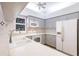 Bright kitchen with neutral cabinets and countertops, and modern appliances at 5902 22Nd Avenue E Dr, Palmetto, FL 34221
