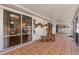Large screened-in porch offering an outdoor space for dining and relaxation with access to inside at 5902 22Nd Avenue E Dr, Palmetto, FL 34221