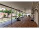 Spacious screened patio with tile flooring, perfect for outdoor relaxation and entertaining at 5902 22Nd Avenue E Dr, Palmetto, FL 34221