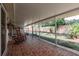 Covered screened patio with tile, plenty of room for seating and enjoying the outdoors at 5902 22Nd Avenue E Dr, Palmetto, FL 34221