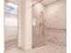 Walk-in shower with upgraded tile, glass door and grab bar at 5902 22Nd Avenue E Dr, Palmetto, FL 34221