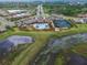 Aerial view of community pool and tennis courts at 5923 Snowy Egret Dr, Sarasota, FL 34238