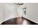 Bright and airy bedroom with hardwood floors, a ceiling fan, and natural light at 5923 Snowy Egret Dr, Sarasota, FL 34238