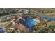 A bird's eye view captures the community center, pool, tennis courts, and well-maintained landscaping at 5923 Snowy Egret Dr, Sarasota, FL 34238
