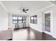 Cozy living room with hardwood floors and water view through large windows at 5923 Snowy Egret Dr, Sarasota, FL 34238