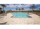 Community swimming pool with spacious sundeck and lounge chairs at 5923 Snowy Egret Dr, Sarasota, FL 34238