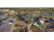 Overhead shot showing community tennis courts near the community center and parking area at 5923 Snowy Egret Dr, Sarasota, FL 34238