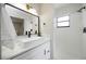 Modern bathroom with black fixtures, vessel sink, and tile shower at 624 Fort Duquesna Dr, Sun City Center, FL 33573