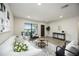 Bright living room featuring modern decor, contemporary furniture and lots of natural light at 624 Fort Duquesna Dr, Sun City Center, FL 33573