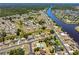 Aerial view of a home with a pool, conveniently located near the river and neighborhood streets at 6698 Acmar Ct, North Port, FL 34287