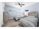 Inviting bedroom with ceiling fan, closet and two beds at 6698 Acmar Ct, North Port, FL 34287