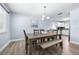 Open dining room with adjacent kitchen for easy entertaining at 6698 Acmar Ct, North Port, FL 34287