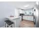 Efficient kitchen featuring modern appliances and an eat-in counter at 6698 Acmar Ct, North Port, FL 34287
