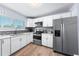 Bright kitchen featuring stainless steel appliances and modern finishes at 6698 Acmar Ct, North Port, FL 34287