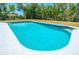 The expansive pool offers a refreshing escape and enhanced backyard experience at 6698 Acmar Ct, North Port, FL 34287