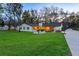 Spacious backyard with a fire pit area and seating, ideal for outdoor entertaining and relaxation at 7016 Dusty Rd, Riverview, FL 33569