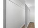 Spacious walk-in closet with custom shelving and ample storage space at 7016 Dusty Rd, Riverview, FL 33569