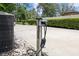 Driveway shows EV charging port for electric vehicles and nearby AC unit at 7016 Dusty Rd, Riverview, FL 33569