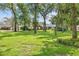 A beautiful home with a well-kept front lawn and mature trees surrounding the property at 7016 Dusty Rd, Riverview, FL 33569