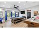 Spacious game room featuring a pool table, drum set, and ample space for entertainment at 7016 Dusty Rd, Riverview, FL 33569