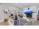 Cozy living room with a fireplace, stylish decor, and comfortable seating area at 7016 Dusty Rd, Riverview, FL 33569