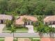 Lovely home with a tile roof, meticulously landscaped yard, and inviting curb appeal in a desirable neighborhood at 7659 Trillium Blvd, Sarasota, FL 34241