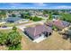 The aerial view highlights the home's location and well-manicured yard at 8123 Wawana Rd, North Port, FL 34287
