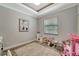 This bedroom is currently set up as a playroom at 8123 Wawana Rd, North Port, FL 34287