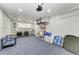 Spacious garage area that doubles as laundry room with epoxy floor and storage options at 8420 43Rd Avenue W Dr, Bradenton, FL 34209