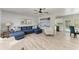 Bright and airy living room with modern furniture and access to the outdoor pool at 8420 43Rd Avenue W Dr, Bradenton, FL 34209