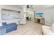 A spacious living room with a serene aesthetic and views to dining area at 8420 43Rd Avenue W Dr, Bradenton, FL 34209