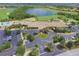 Expansive aerial view of the clubhouse, golf course, and recreational area within a landscaped community at 8603 River Preserve Dr, Bradenton, FL 34212