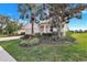 Well maintained single Gathering home surrounded by mature trees and green lawn at 8603 River Preserve Dr, Bradenton, FL 34212