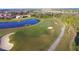 Beautiful aerial view of the community golf course with lush green fairways and serene water features at 8603 River Preserve Dr, Bradenton, FL 34212