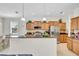 Kitchen with stainless steel appliances, granite countertops, and breakfast bar seating at 8603 River Preserve Dr, Bradenton, FL 34212