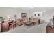 Spacious upstairs sitting area, decorated with comfortable sofas, stylish decor, and a work station at 8603 River Preserve Dr, Bradenton, FL 34212