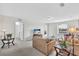 Inviting living room with comfortable seating, a view of the outdoors, and ample natural light at 8603 River Preserve Dr, Bradenton, FL 34212