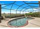 Enclosed pool area features clear water, brick accents, and screened enclosure for outdoor fun and relaxation at 8603 River Preserve Dr, Bradenton, FL 34212