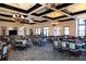 Elegant restaurant featuring high ceilings, ambient lighting, large windows, and ample seating for patrons at 8603 River Preserve Dr, Bradenton, FL 34212