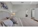 Neutral tones create a relaxing atmosphere in this comfortable bedroom at 927 River Basin Ct # 201C, Bradenton, FL 34212
