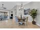 Elegant dining room with a stylish chandelier and access to the living area at 927 River Basin Ct # 201C, Bradenton, FL 34212