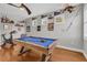 Recreation room has a pool table, workout equipment, and decorative accents at 927 River Basin Ct # 201C, Bradenton, FL 34212