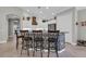 Charming kitchen features a patterned island, subway tile backsplash, and modern stainless steel appliances at 927 River Basin Ct # 201C, Bradenton, FL 34212
